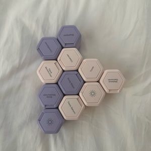 Cadence travel containers